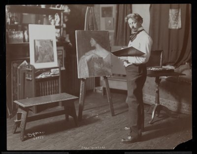 Charles Winter painting in his studio, New York, 1907 by Byron Company